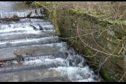 Walls at the water race in need of repair